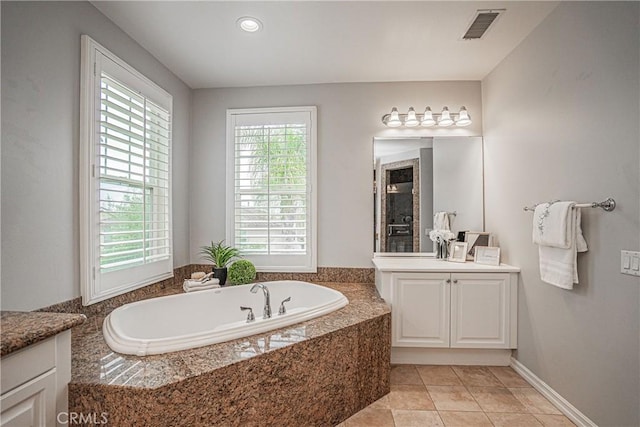 full bath with visible vents, vanity, a shower, tile patterned floors, and a bath