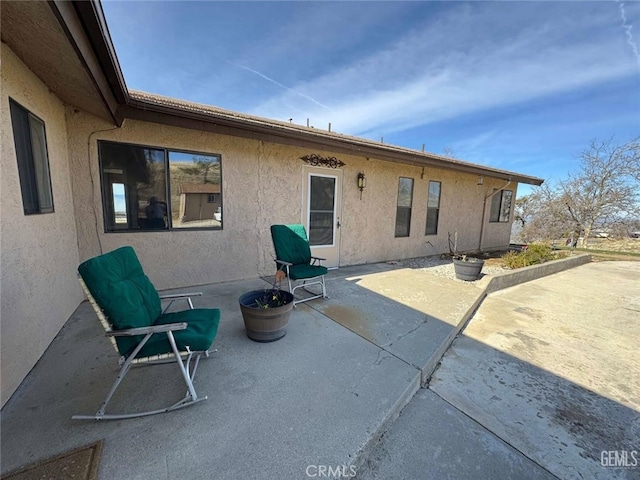 30830 Roan Ct, Tehachapi, CA 93561 - rear view of property with a patio area and stucco siding