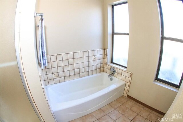 30830 Roan Ct, Tehachapi, CA 93561 - full bath featuring baseboards, tile patterned floors, and a bath