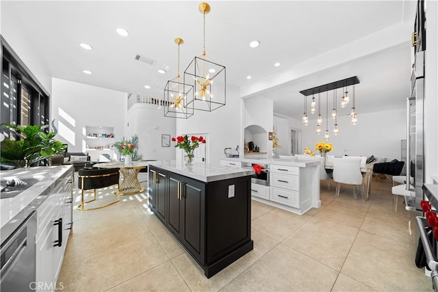 5 Westchester Ct, Coto De Caza, CA 92679 - kitchen with open floor plan, stainless steel appliances, light tile patterned flooring, white cabinets, and recessed lighting
