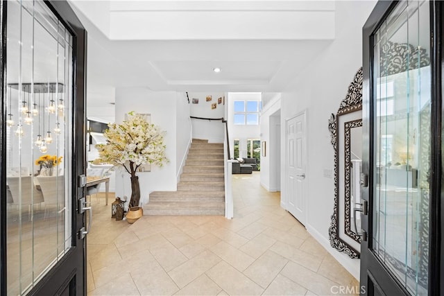 5 Westchester Ct, Coto De Caza, CA 92679 - entryway featuring a tray ceiling, stairs, light tile patterned floors, baseboards, and recessed lighting