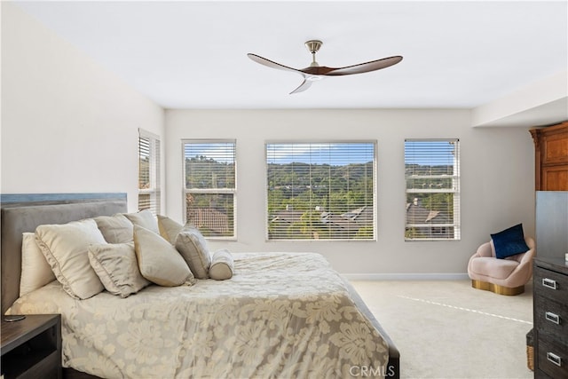 5 Westchester Ct, Coto De Caza, CA 92679 - carpeted bedroom with multiple windows, baseboards, and a ceiling fan