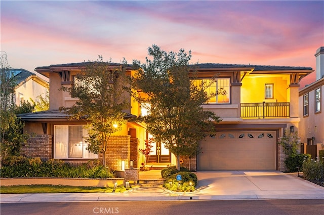 5 Westchester Ct, Coto De Caza, CA 92679 - view of front of house with an attached garage, concrete driveway, stucco siding, and brick siding