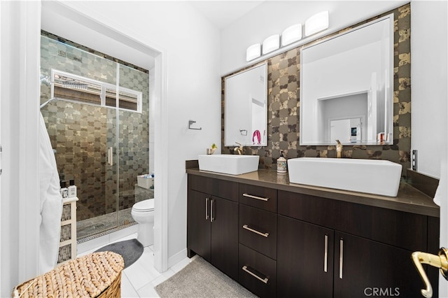 5 Westchester Ct, Coto De Caza, CA 92679 - bathroom with tile patterned flooring, a shower stall, double vanity, and toilet