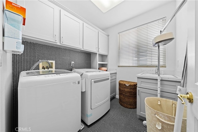 5 Westchester Ct, Coto De Caza, CA 92679 - laundry area with cabinet space, washing machine and dryer, and dark tile patterned flooring