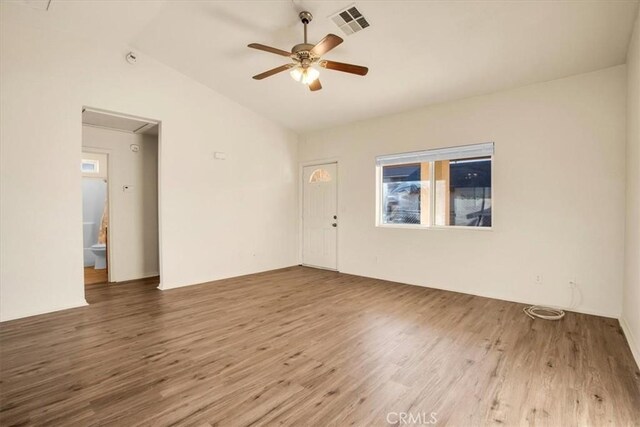 60803 Division St, Joshua Tree, CA 92252 - unfurnished room featuring wood finished floors, a ceiling fan, and lofted ceiling