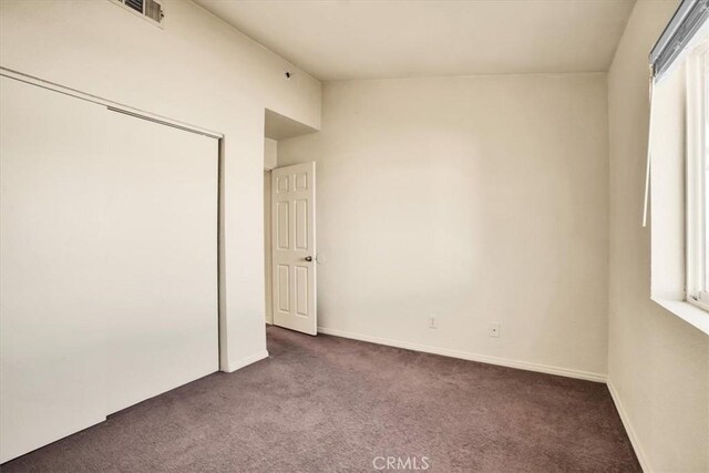 60803 Division St, Joshua Tree, CA 92252 - unfurnished bedroom featuring carpet and a closet