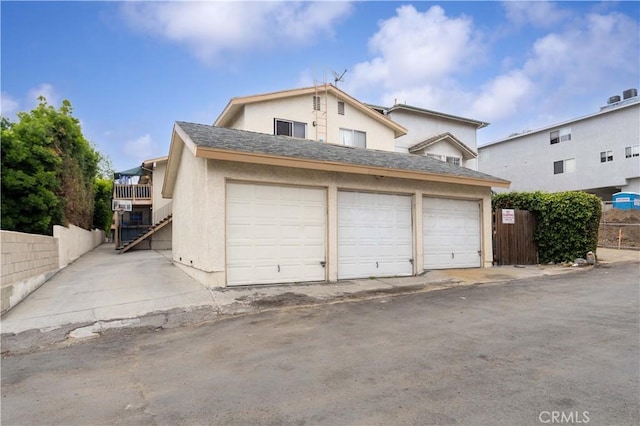 garage featuring fence