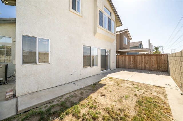 view of yard featuring a patio and a fenced backyard