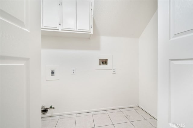 washroom with cabinet space, light tile patterned flooring, washer hookup, hookup for a gas dryer, and hookup for an electric dryer