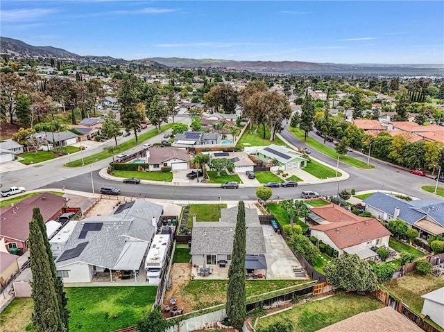 aerial perspective of suburban area with a mountain backdrop