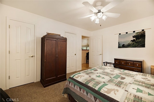 carpeted bedroom with a ceiling fan
