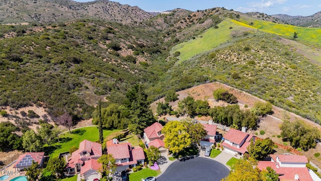 drone / aerial view featuring a mountain view and a residential view