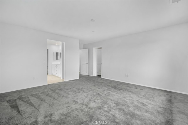 2017 Juniper Ln, Colton, CA 92324 - unfurnished bedroom with carpet, ensuite bath, and baseboards