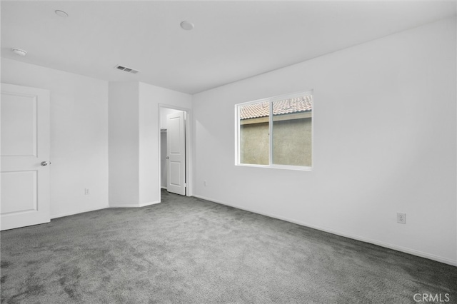 2017 Juniper Ln, Colton, CA 92324 - unfurnished bedroom featuring carpet flooring, baseboards, and visible vents