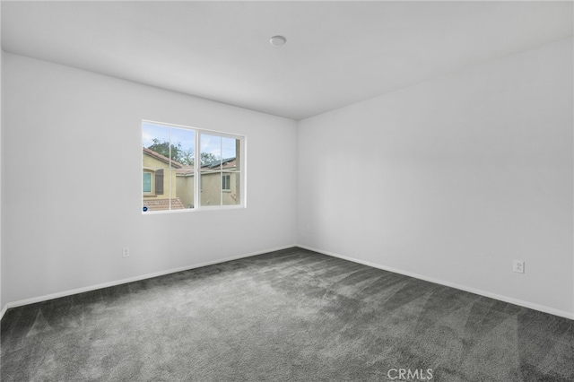 2017 Juniper Ln, Colton, CA 92324 - spare room with baseboards and carpet floors