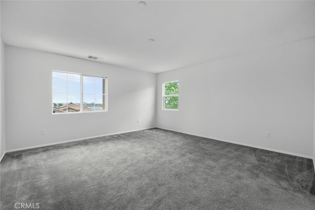 2017 Juniper Ln, Colton, CA 92324 - unfurnished room featuring carpet floors, baseboards, and visible vents