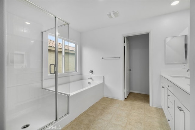 2017 Juniper Ln, Colton, CA 92324 - full bath featuring a bath, vanity, visible vents, and a shower stall