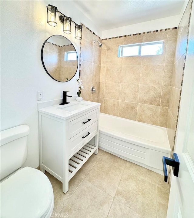bathroom with toilet, tile patterned floors, bathing tub / shower combination, and vanity