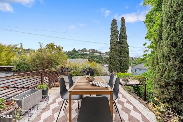 view of patio featuring outdoor dining area