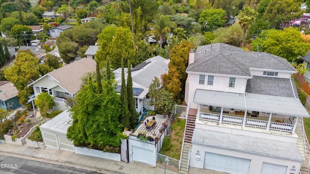 birds eye view of property with a residential view