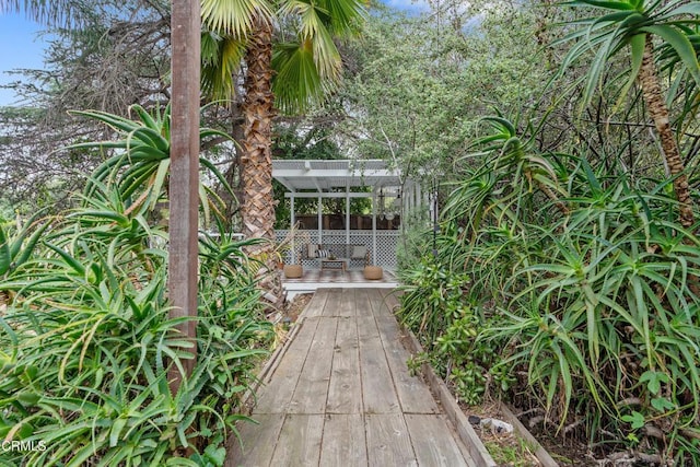 entrance to property with a wooden deck