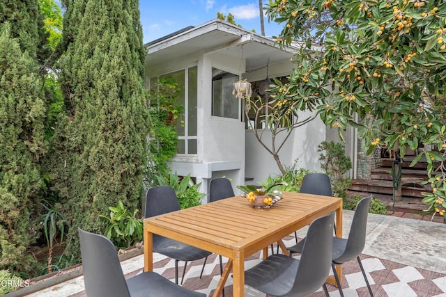 view of patio with outdoor dining area
