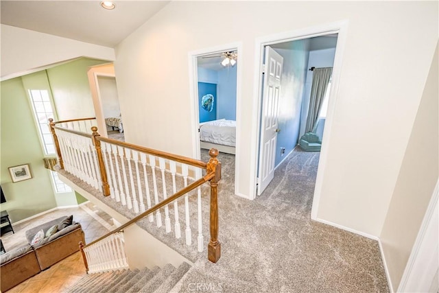 hallway featuring carpet floors, recessed lighting, and baseboards