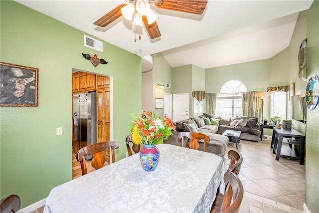 dining room featuring a ceiling fan, light tile patterned flooring, and visible vents