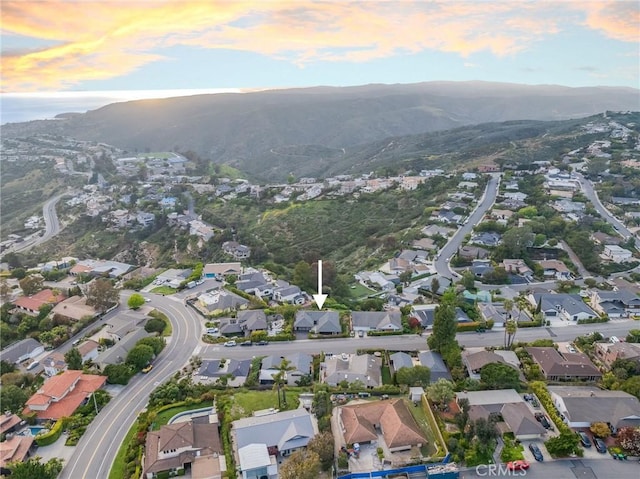 bird's eye view featuring a mountain view and a residential view