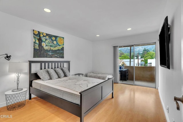 bedroom with access to outside, baseboards, recessed lighting, and light wood-style flooring