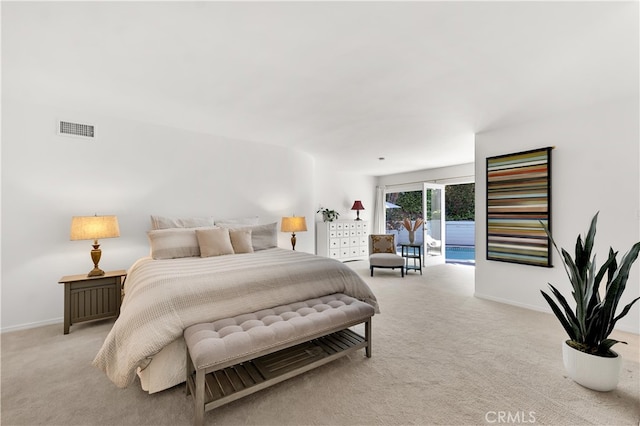 bedroom with access to outside, baseboards, visible vents, and light carpet