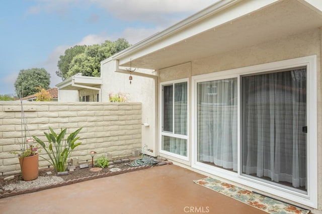 view of patio / terrace with fence