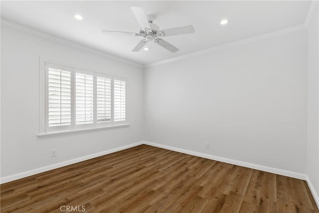 unfurnished room with recessed lighting, baseboards, and wood finished floors
