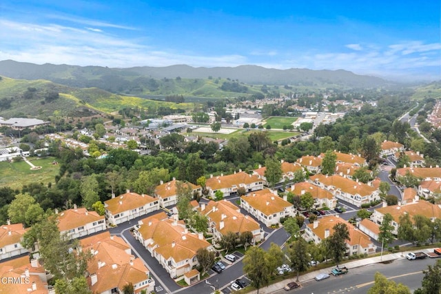 aerial view with a mountain view and a residential view