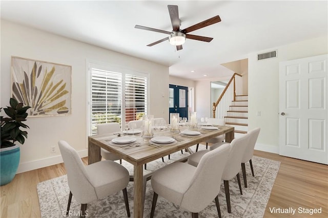 23341 Bessemer St, Woodland Hills, CA 91367 - dining space with visible vents, stairs, baseboards, light wood-style floors, and french doors
