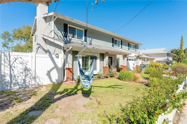23341 Bessemer St, Woodland Hills, CA 91367 - view of front facade featuring brick siding, fence, and a chimney