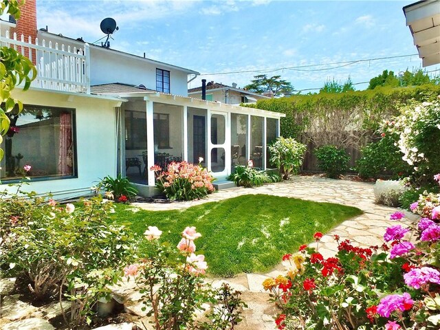 3835 California Ave, Long Beach, CA 90807 - view of yard with a sunroom, a patio, and a balcony