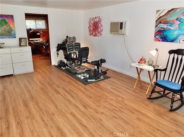 3835 California Ave, Long Beach, CA 90807 - workout room with light wood-style flooring and a wall mounted AC