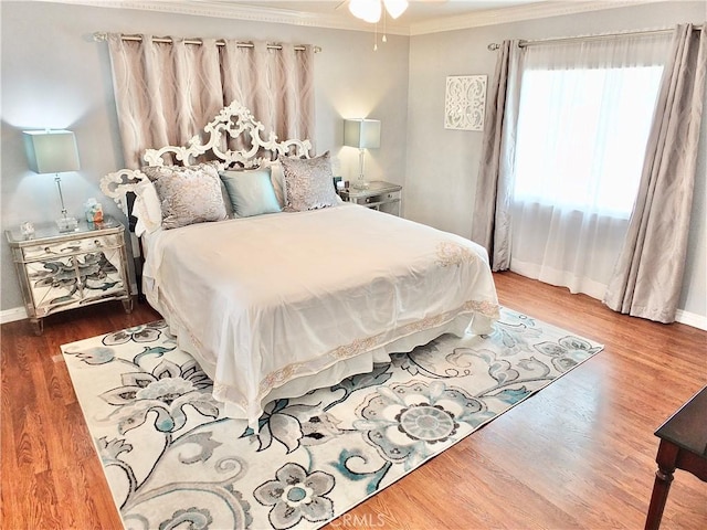 3835 California Ave, Long Beach, CA 90807 - bedroom with crown molding, baseboards, and wood finished floors