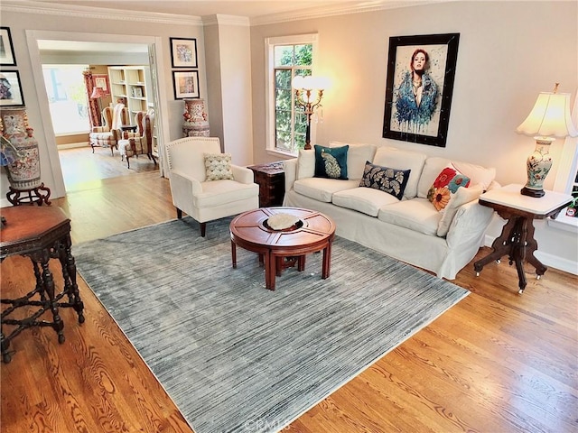 3835 California Ave, Long Beach, CA 90807 - living area with crown molding, wood finished floors, and baseboards