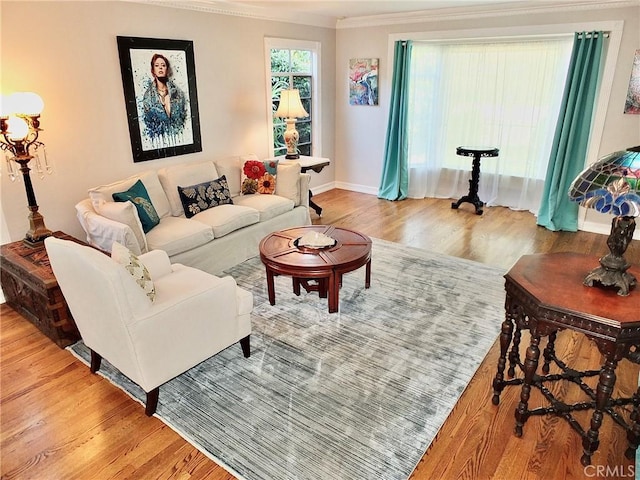 3835 California Ave, Long Beach, CA 90807 - living room featuring wood finished floors, ornamental molding, and baseboards
