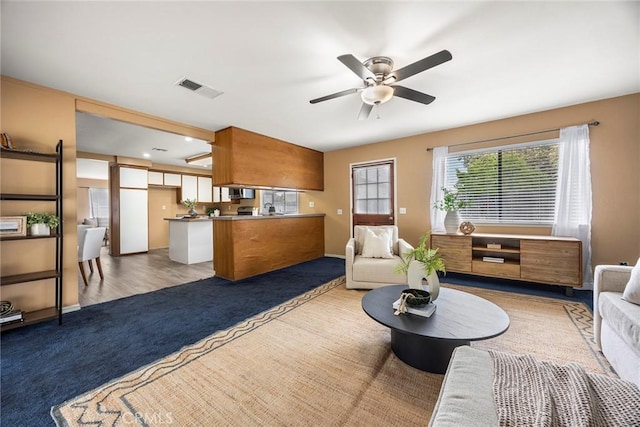 3881 Valle Vista Dr, Chino Hills, CA 91709 - living area featuring light colored carpet and a ceiling fan