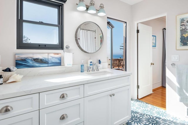 full bathroom featuring vanity and a shower with shower curtain
