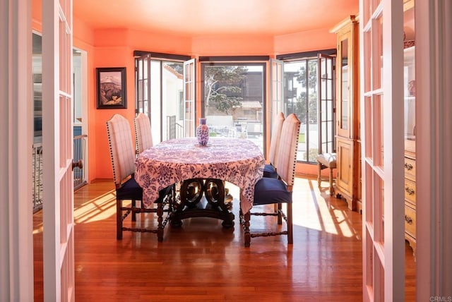 dining area featuring wood finished floors