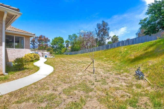 view of yard featuring fence