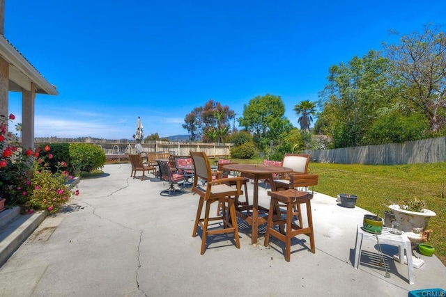 view of patio / terrace with a fenced backyard and outdoor dining area