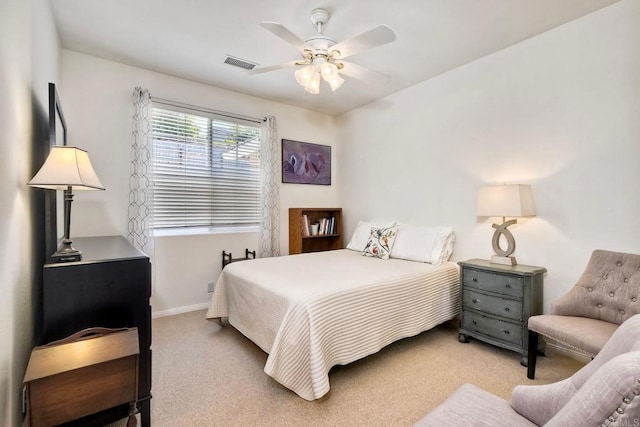 bedroom with baseboards, ceiling fan, carpet, and visible vents