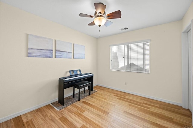 1752 Cottonwood Dr, Vista, CA 92081 - living area with light wood-style flooring, baseboards, and a ceiling fan