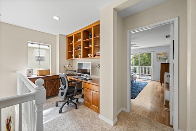 1752 Cottonwood Dr, Vista, CA 92081 - home office featuring baseboards, light colored carpet, built in study area, and recessed lighting
